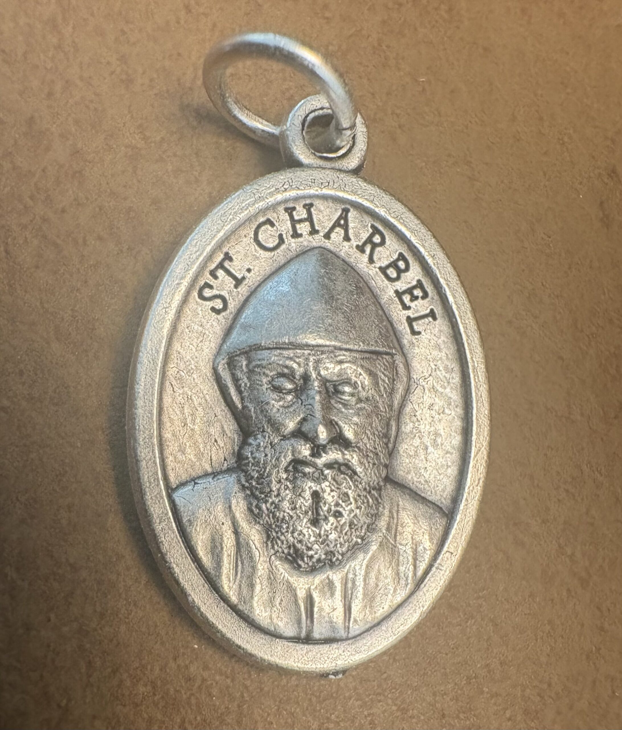 Saint Charbel Makhlouf Medal Silver-Plated ZAMAC 1″ Saint Charbel Makhlouf Medal Silver-Plated ZAMAC 1"