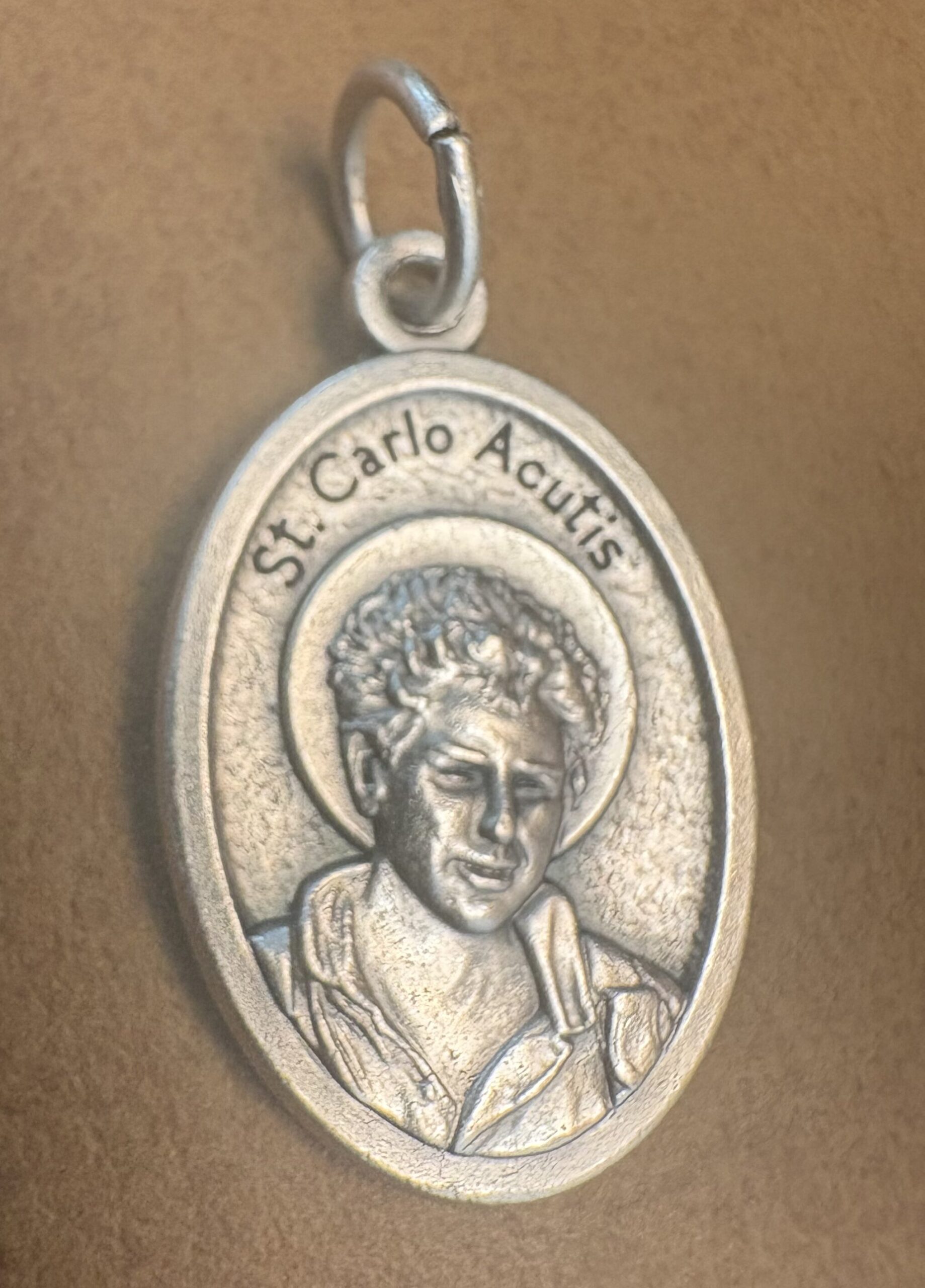 Saint Carlo Acutis Medal Silver-Plated ZAMAC 1″ Saint Carlo Acutis Medal – Silver-Plated ZAMAC – Made in Italy – 1"